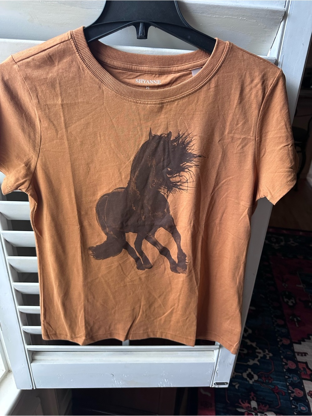 Shyanne Rust Orange Tee with Dark Brown Horse Graphic
